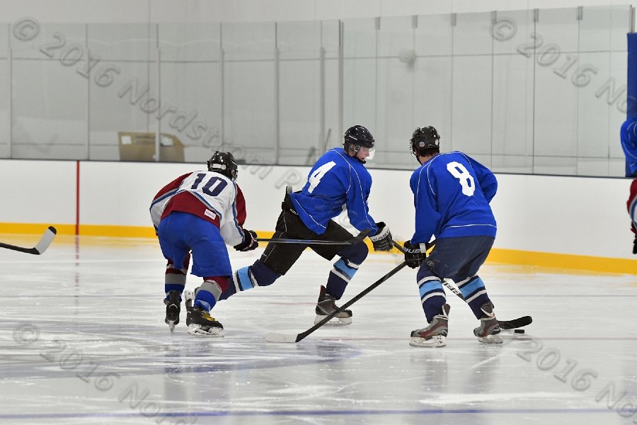 Wheaton College Men\'s Ice Hockey vs Middlesex Community College. - Photo By: KEITH NORDSTROM